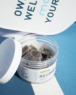 Jar of gummies with a blue background and Modifi branding.